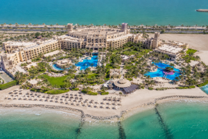 Luxury beachfront resort with pools and palms